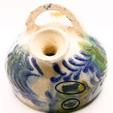 Rustic gurel with floral motifs