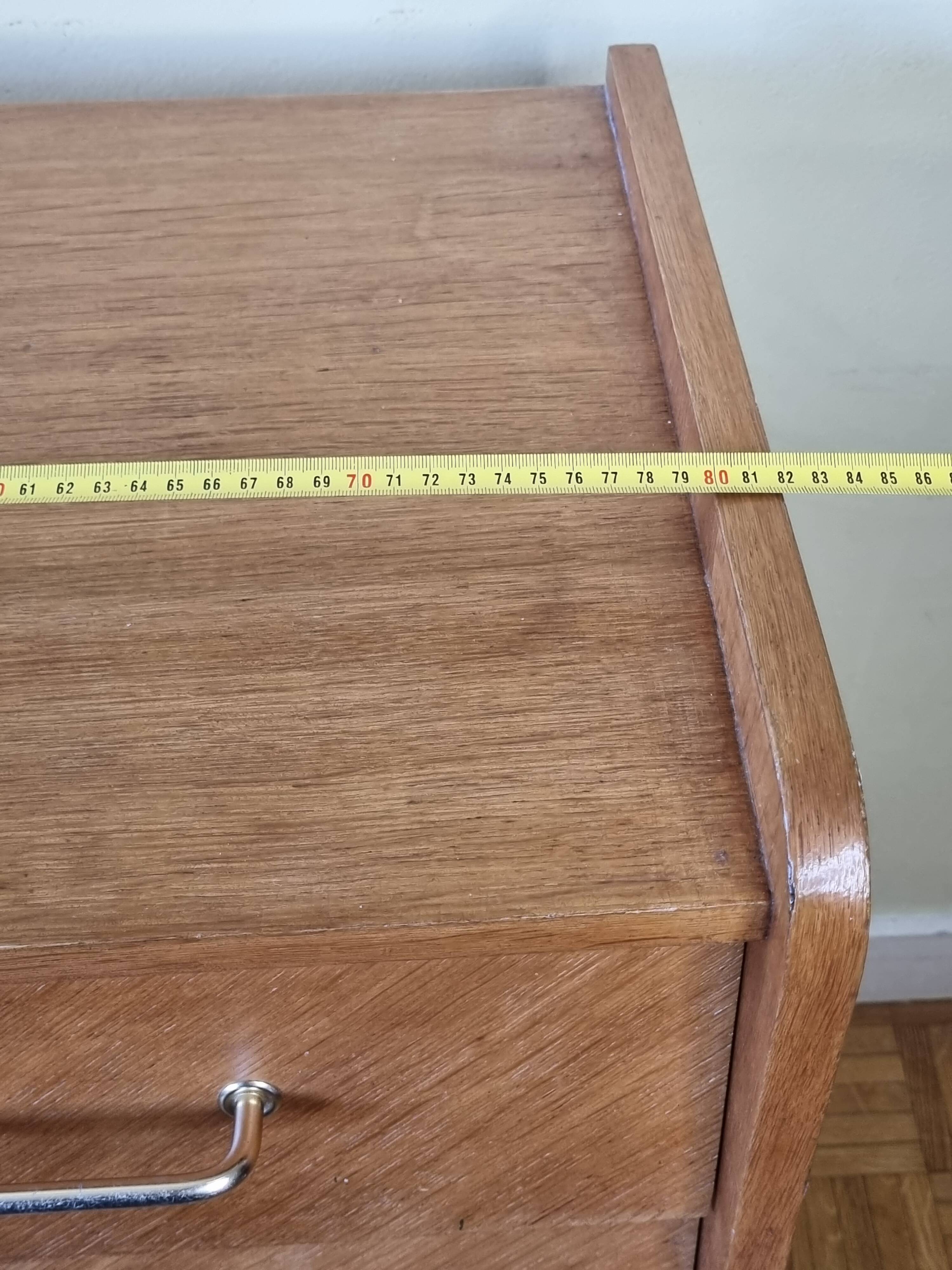 Vintage chest of drawers in modernist veneered wood from the 50s