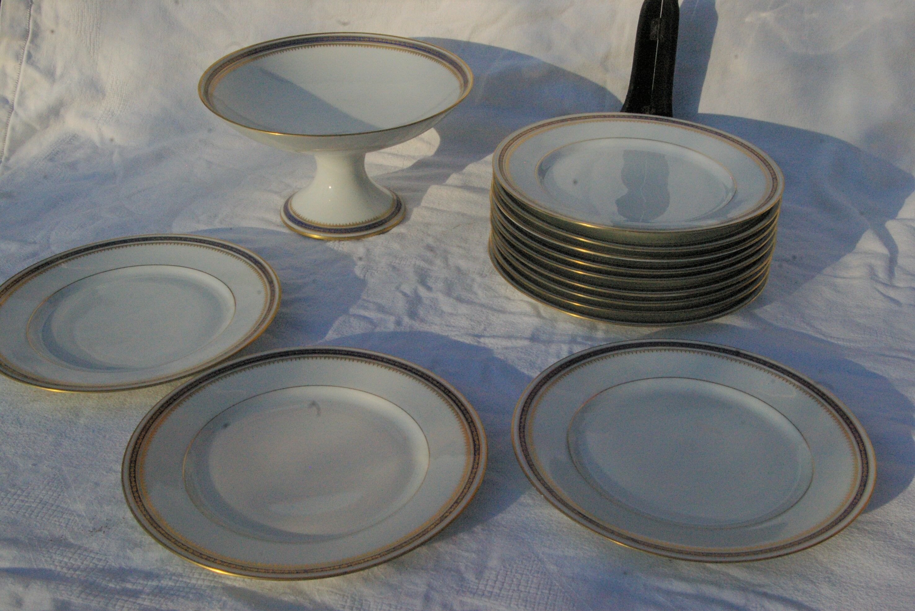 Table service 58 pieces in limoges porcelain uc - blue and gold border