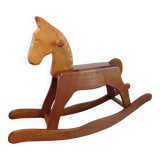 Cheval de bois ancien à bascule