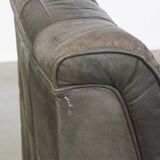 Gray leather design element/ armchair from the 70s + footstool