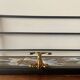 Vintage wall-mounted coat rack in steel, brass and ceramic