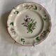 Assiette de Nevers en faïence fin XVIIIe siècle décor floral