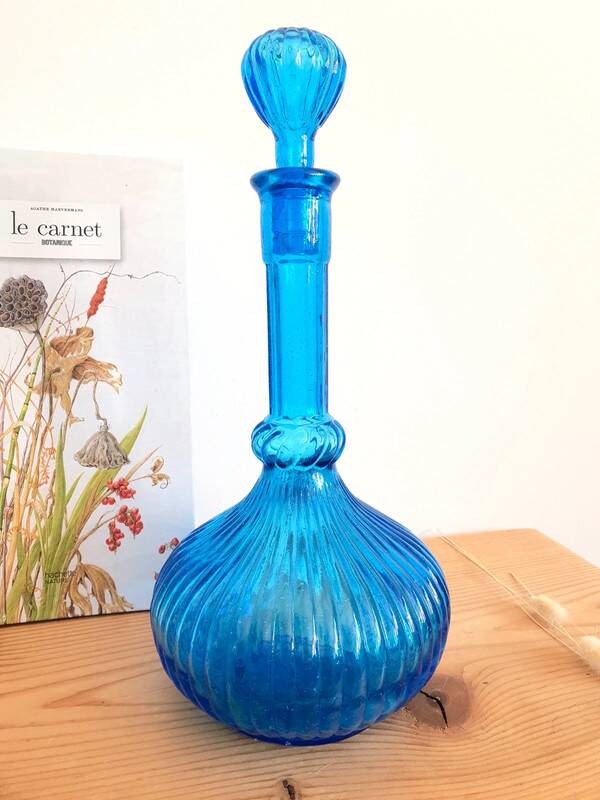 Large blue glass carafe