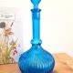 Large blue glass carafe