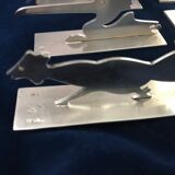 12 knife holders signed Yorel Art Deco
