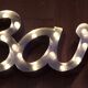 Ancient Light Sign in aluminium lettering forming the word "BAR"