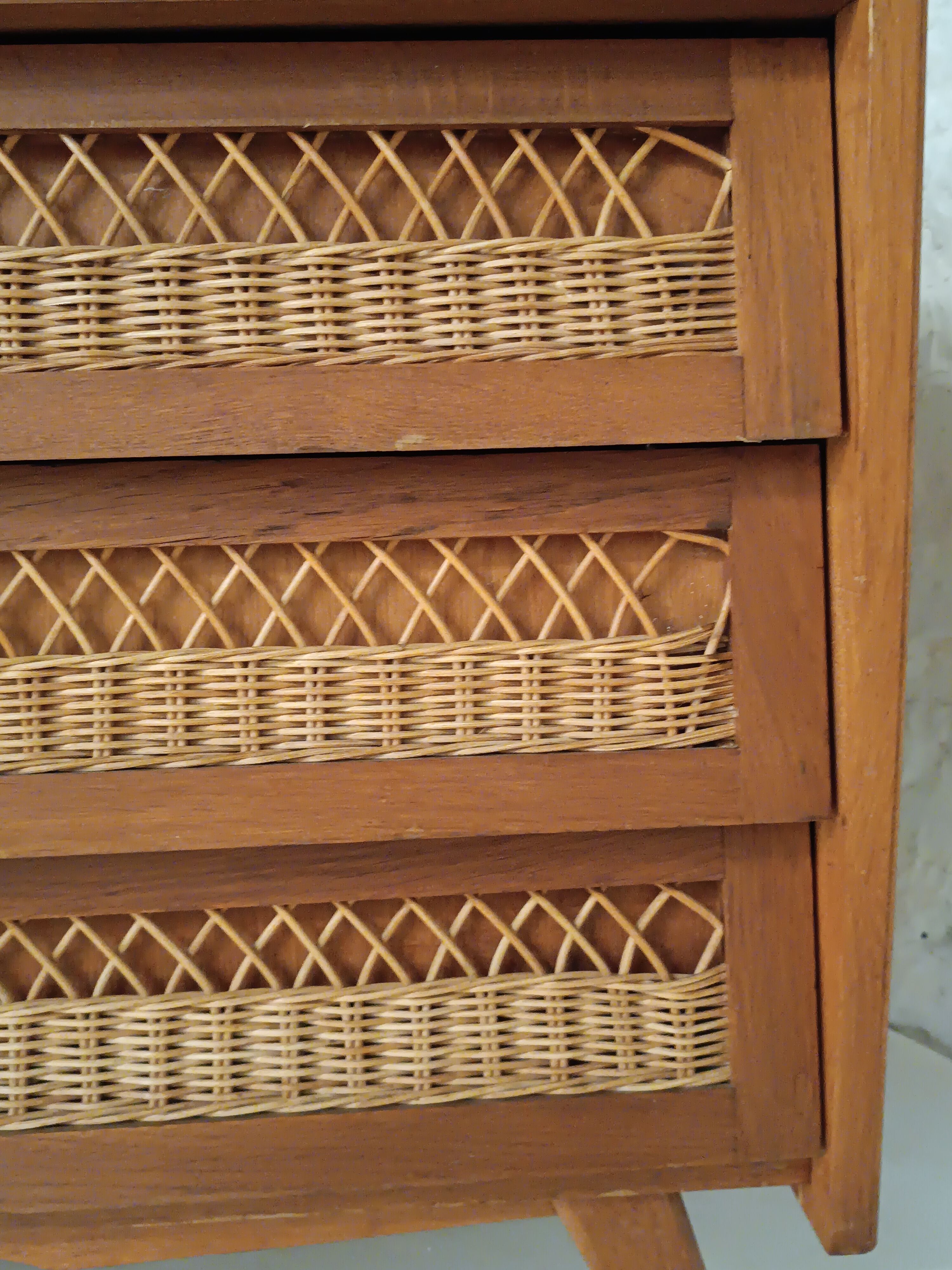 Vintage wooden and rattan chest of drawers in the 60s