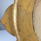 Miroir Hollywood Regency en bois doré sculpté avec motif de fleurs et de soleil, années 1950