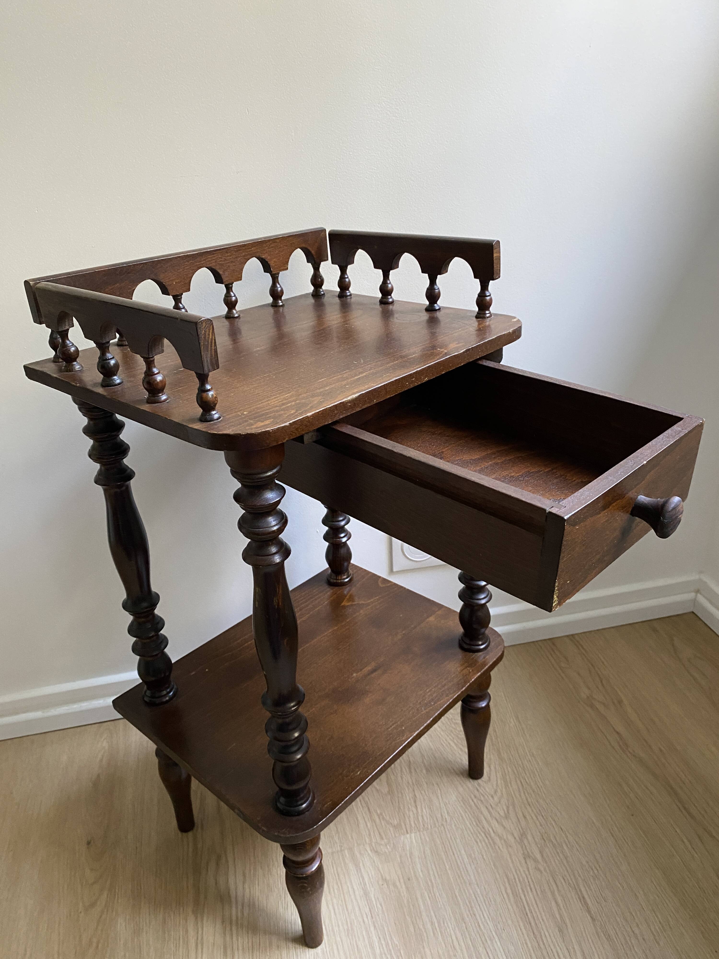 Nightstand, turned wooden bedside table opening with a drawer, vintage telephone table.