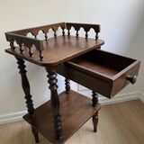 Nightstand, turned wooden bedside table opening with a drawer, vintage telephone table.