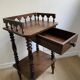 Nightstand, turned wooden bedside table opening with a drawer, vintage telephone table.