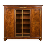 Important flamed mahogany library in Empire style from around 1900.