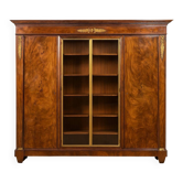 Important flamed mahogany library in Empire style from around 1900.