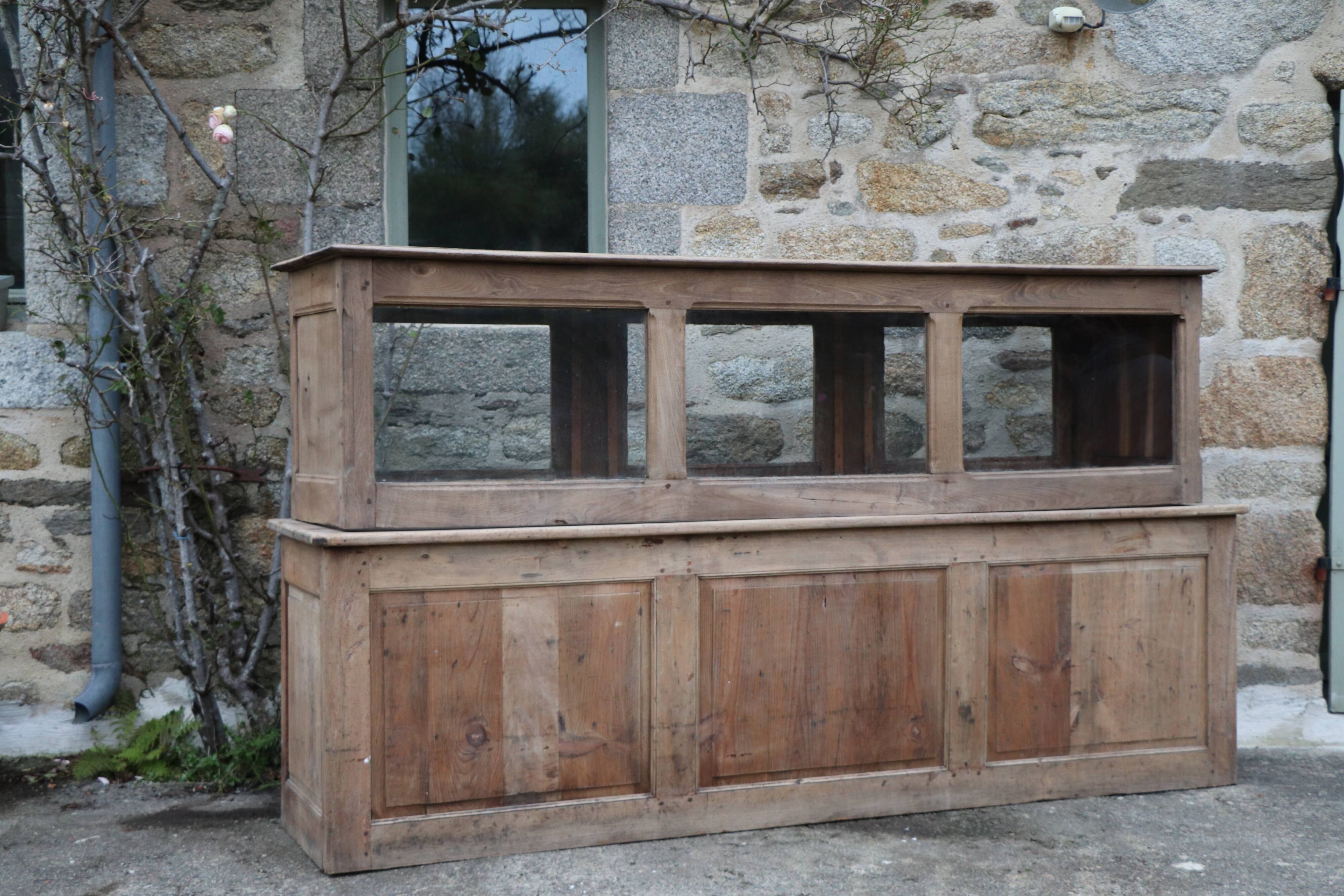 Comptoir vitrine chapellerie 1930