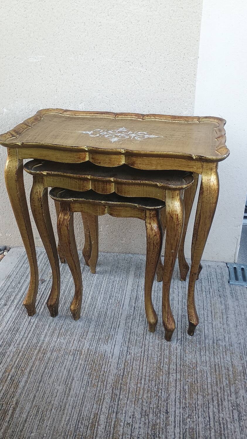 Set of three nesting tables in gilded wood in Florentine style Hollywo.