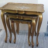 Set of three nesting tables in gilded wood in Florentine style Hollywo.