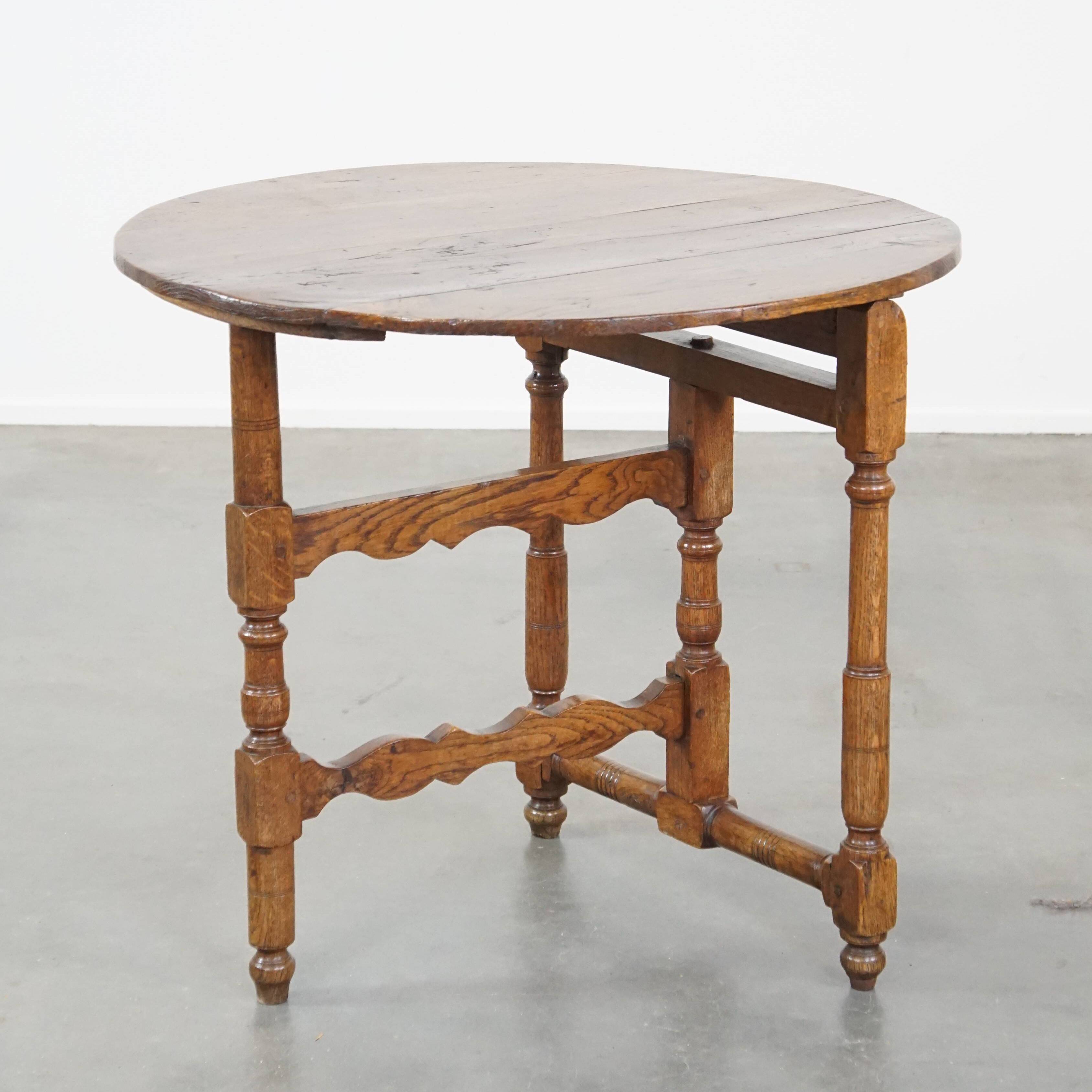 Round, folding antique 18th-century French wine/country table