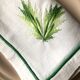 Series of four embroidered linen napkins