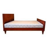Varnished wooden bed with mattress base