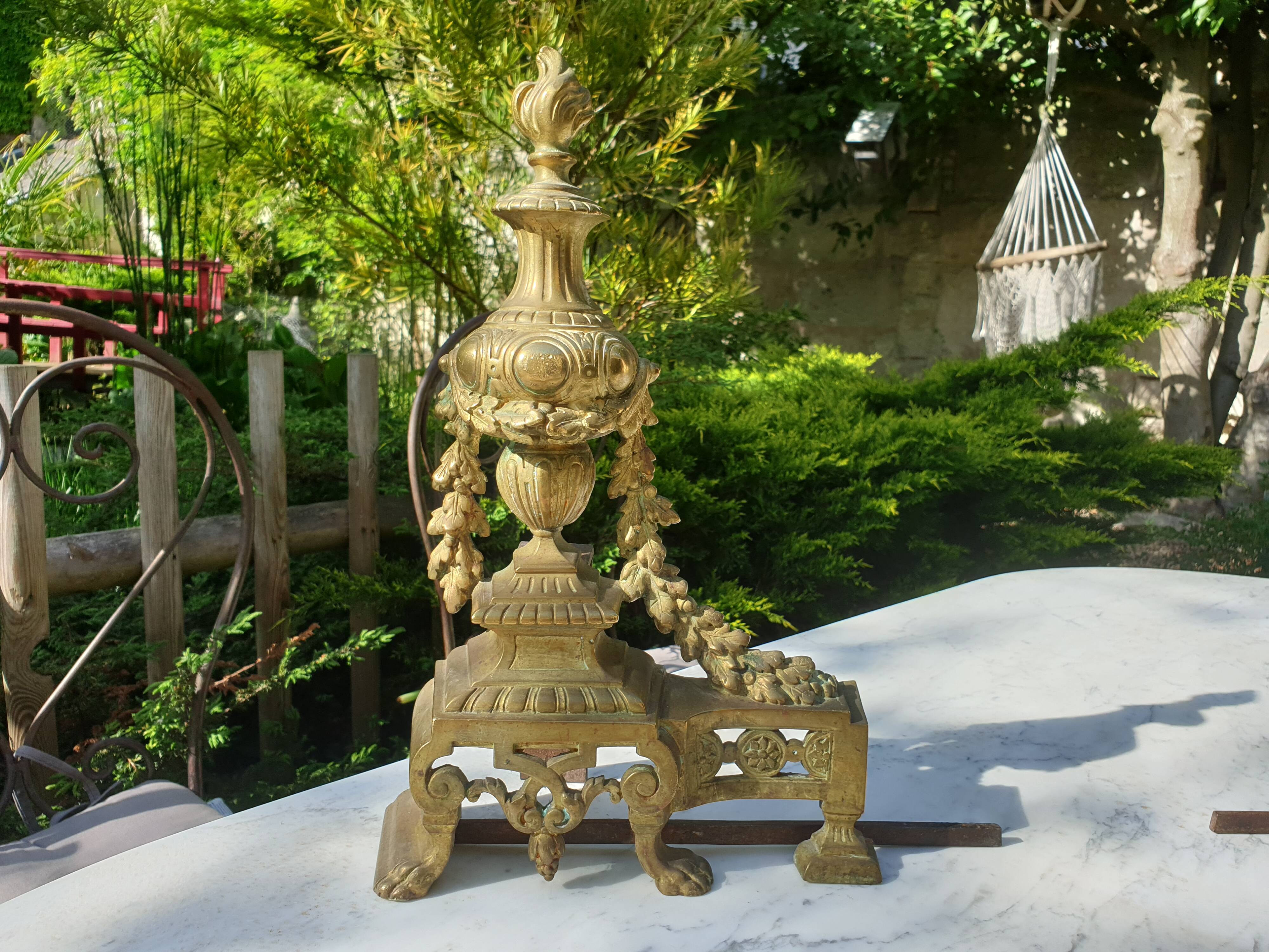 Chenêts and chimney bar in bronze nineteenth century.