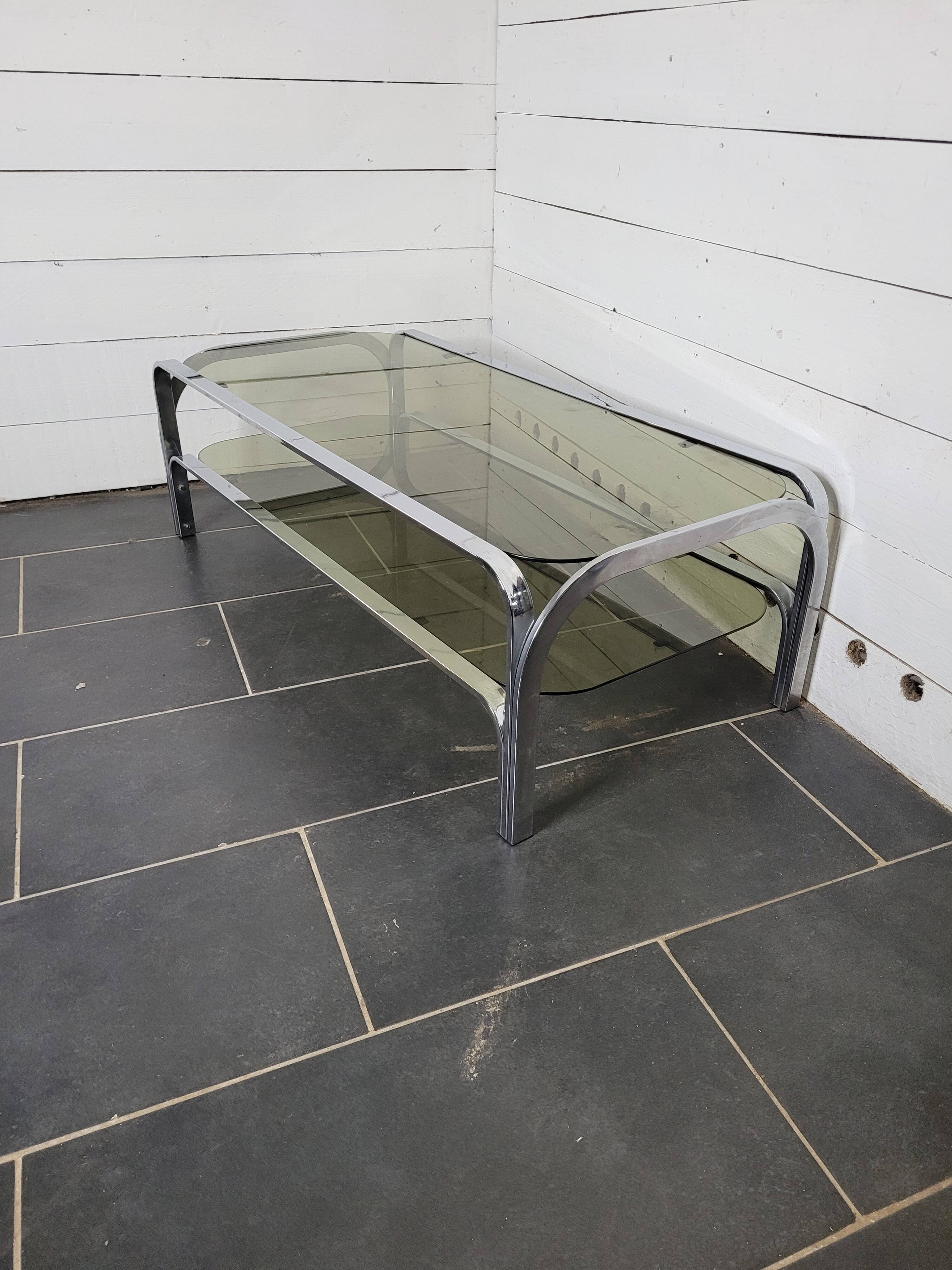 Chromed metal coffee table with smoked glass top from the 70s