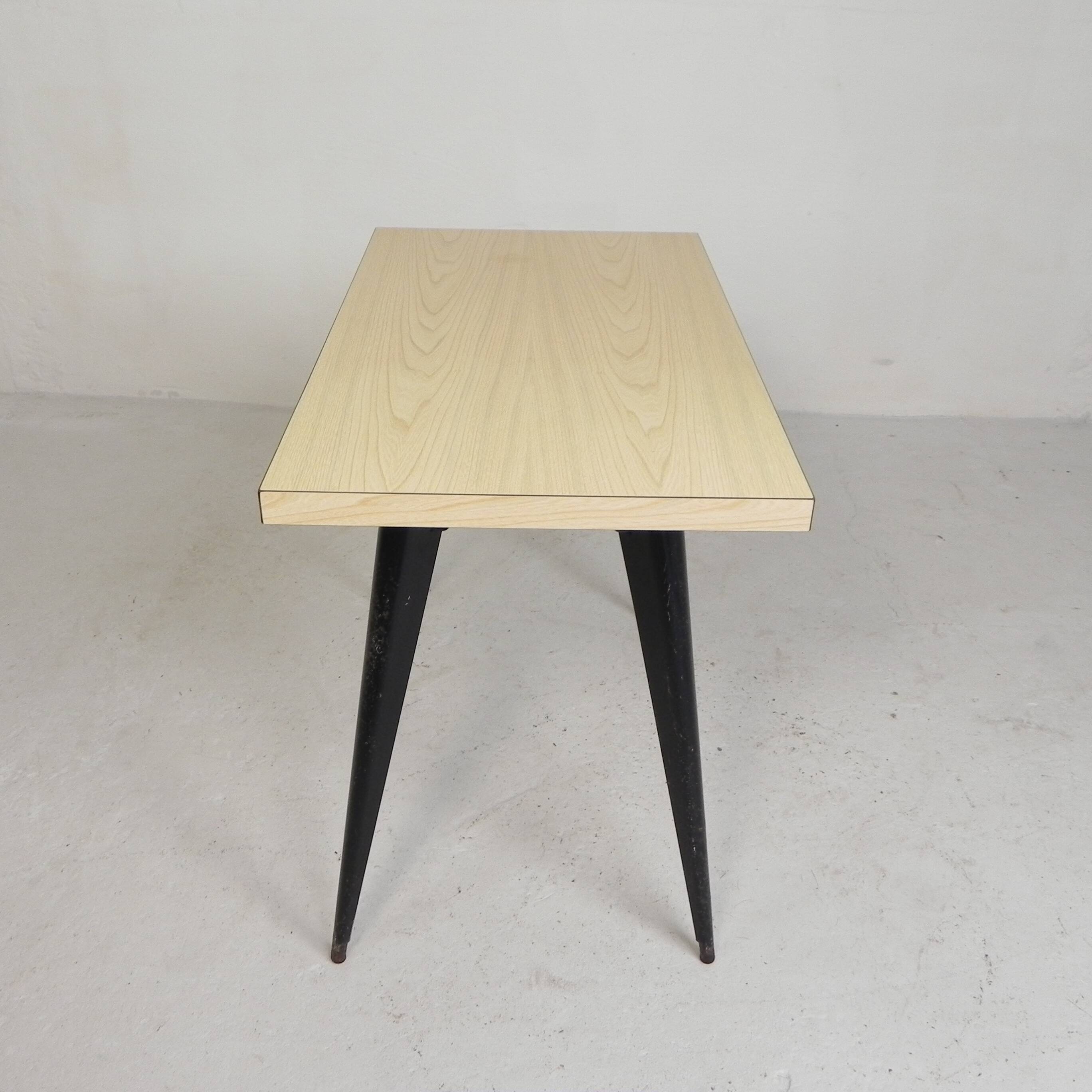 Bistro table Henri Julien, model Tolix T55 with a Formica top, 1950s.