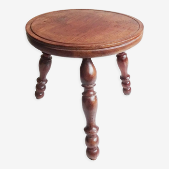 wooden tripod stool