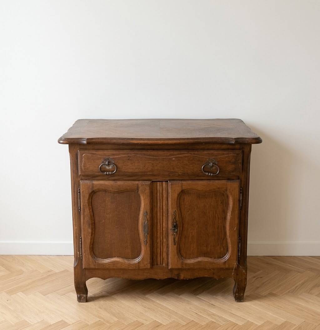 Rustic low cabinet in wood with herringbone marquetry.