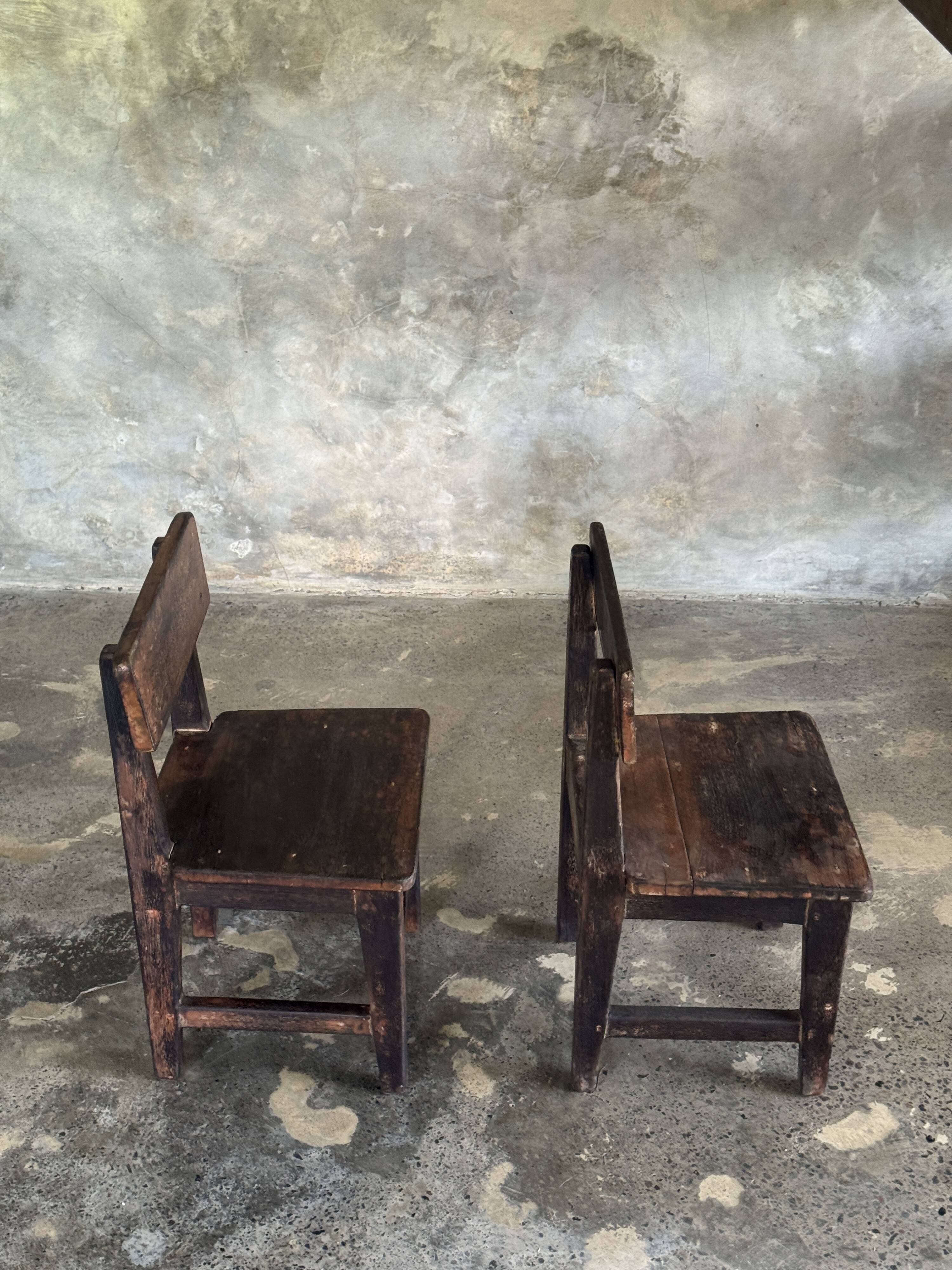 Small antique Indonesian children's chair in teak.