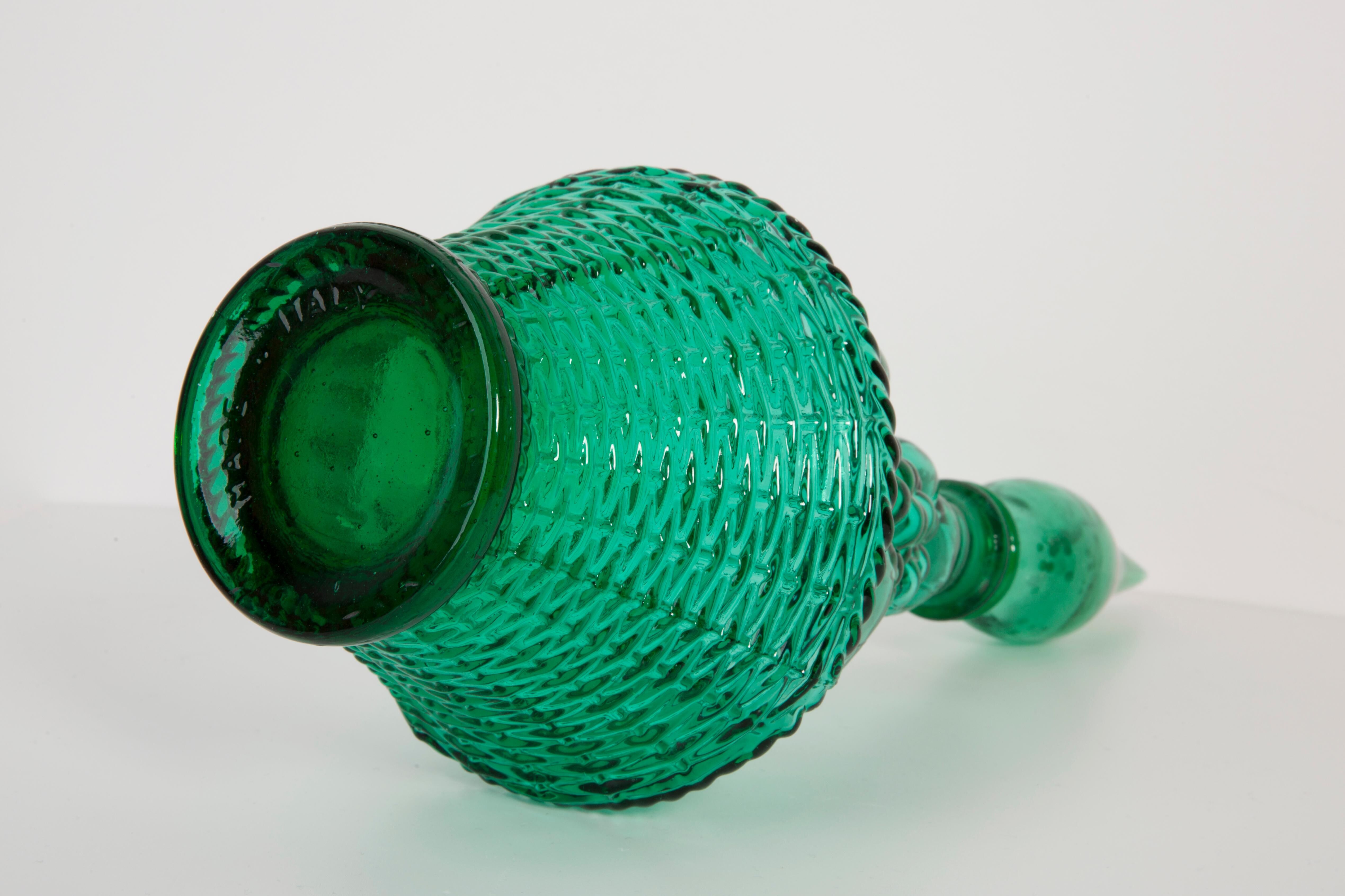 Set of two Genie green glass carafes.