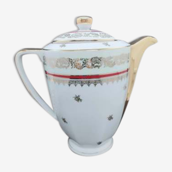 Porcelain coffee maker of gold and burgundy