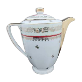 Porcelain coffee maker of gold and burgundy