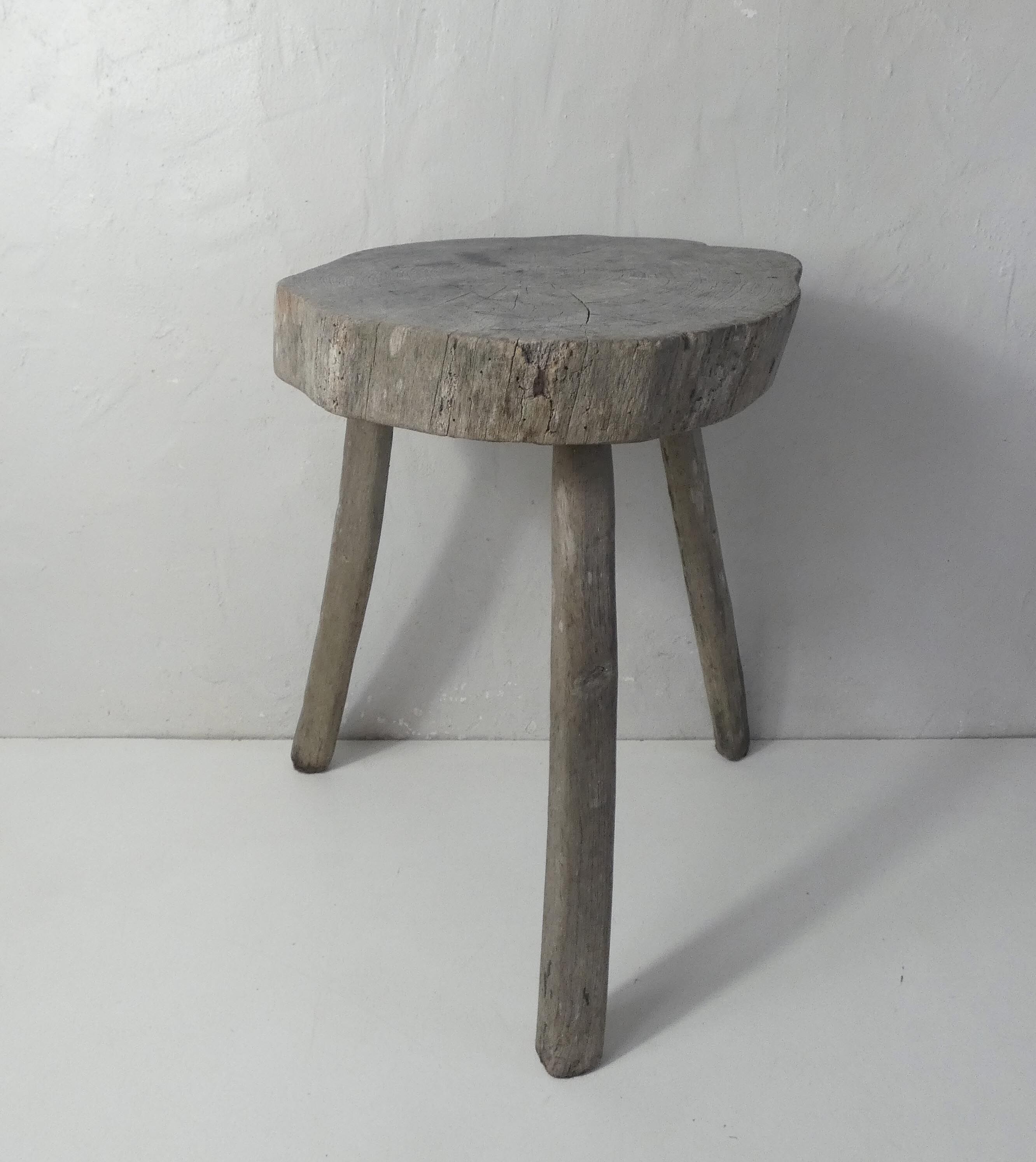 Old brutalist solid wood stool