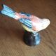 Collector's bird in painted porcelain