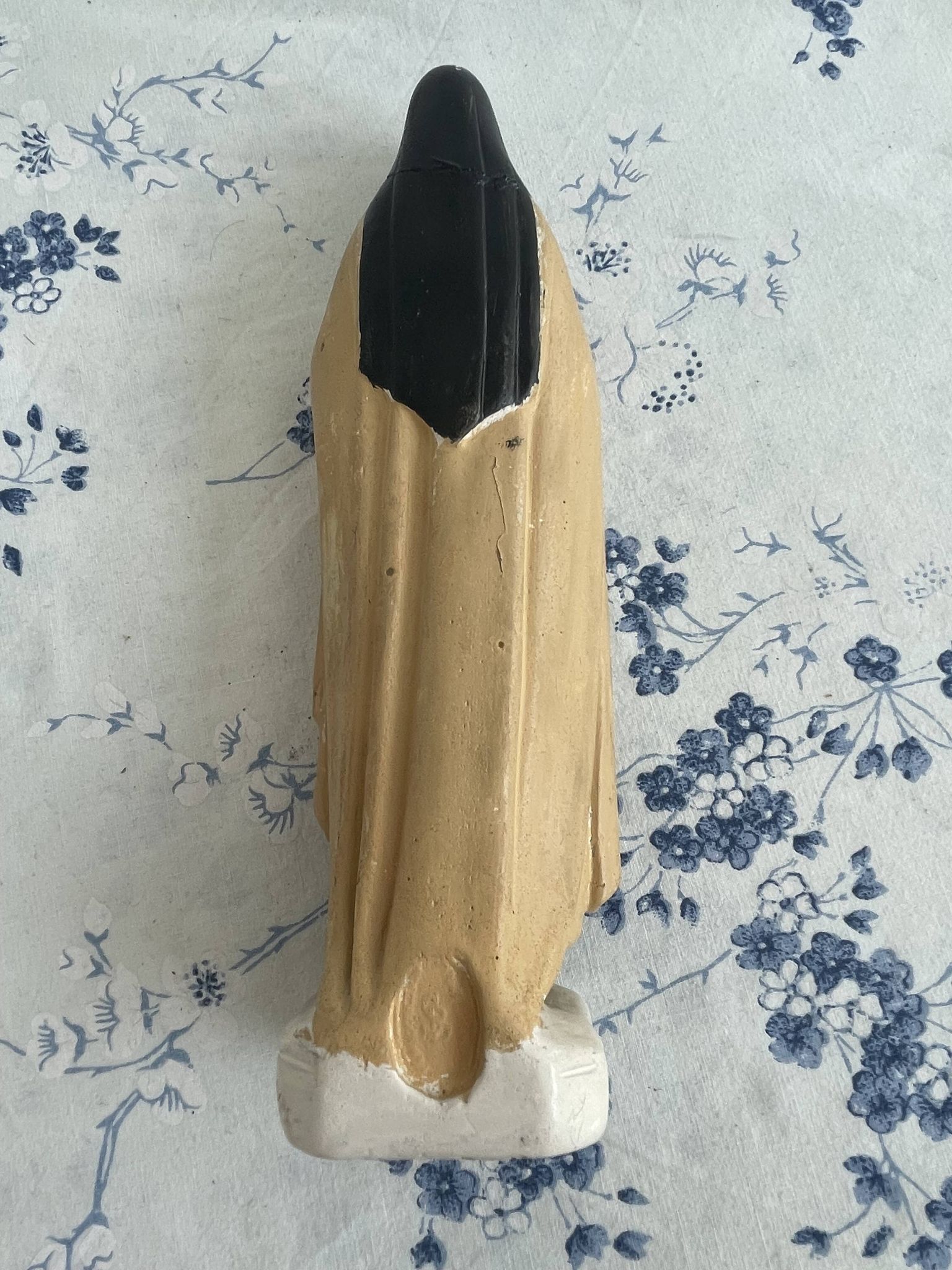 Antique statue of Saint Therese of Lisieux, religious plaster figurine