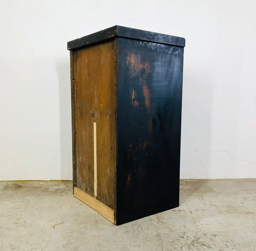 Antique black patinated bedside table