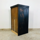 Antique black patinated bedside table