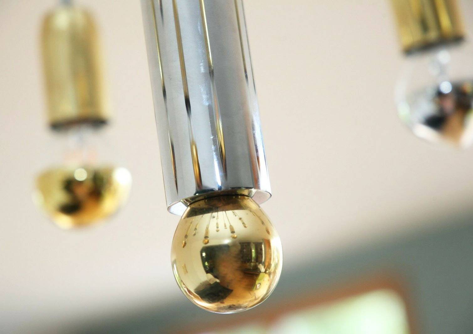 Post-modern chandelier with 24 lights in chrome and gold metal, Germany, 1970.