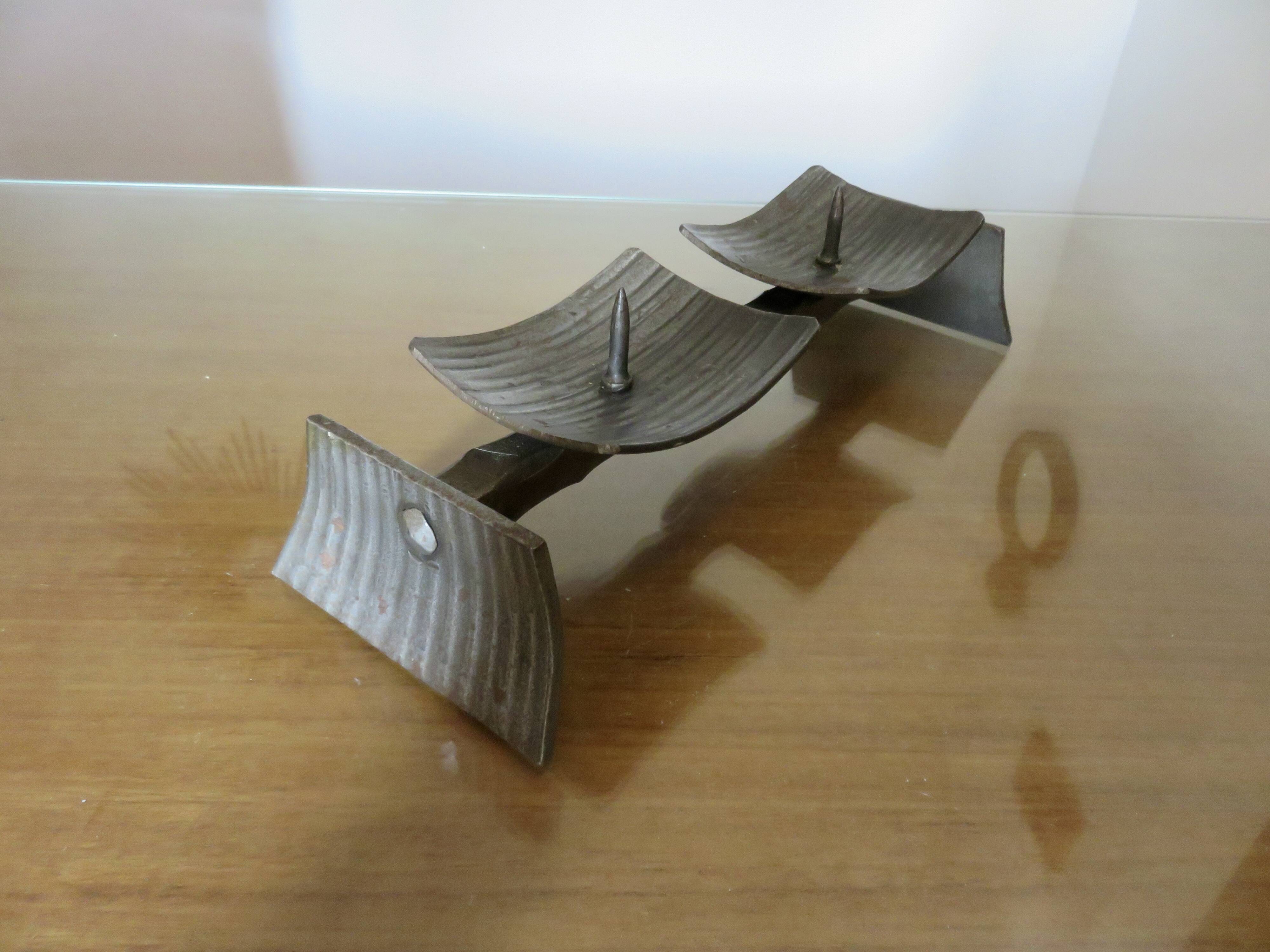 Large brutalist candlestick in the style of the Marolles workshops, raw steel.