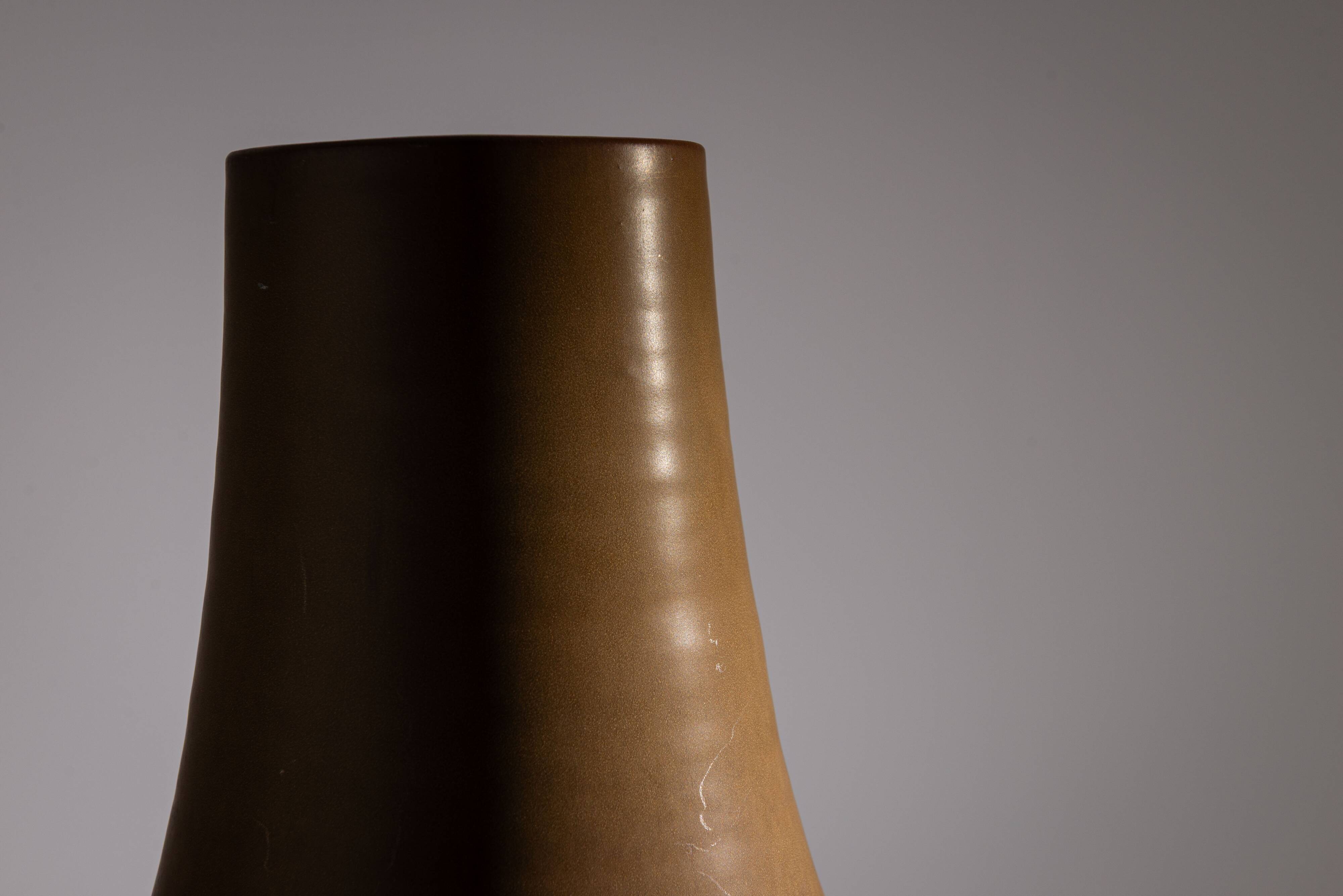 Minimalist curved stoneware vase in matte sand finish