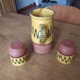 Ceramic carafe and two matching ceramic cups