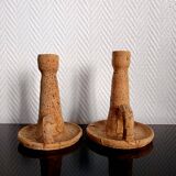 Pair of cork and terracotta candlesticks.