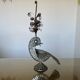 metal sculpture in sheet metal representing a peacock, work from the 1960s