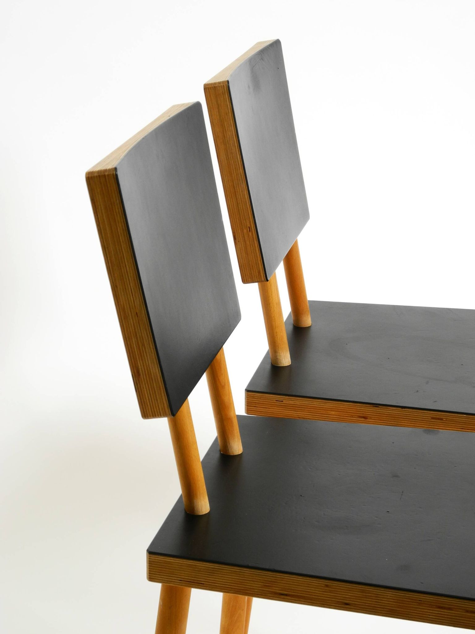 Two rare demountable plywood chairs by Axel Kufus model Stöcke for Atoll