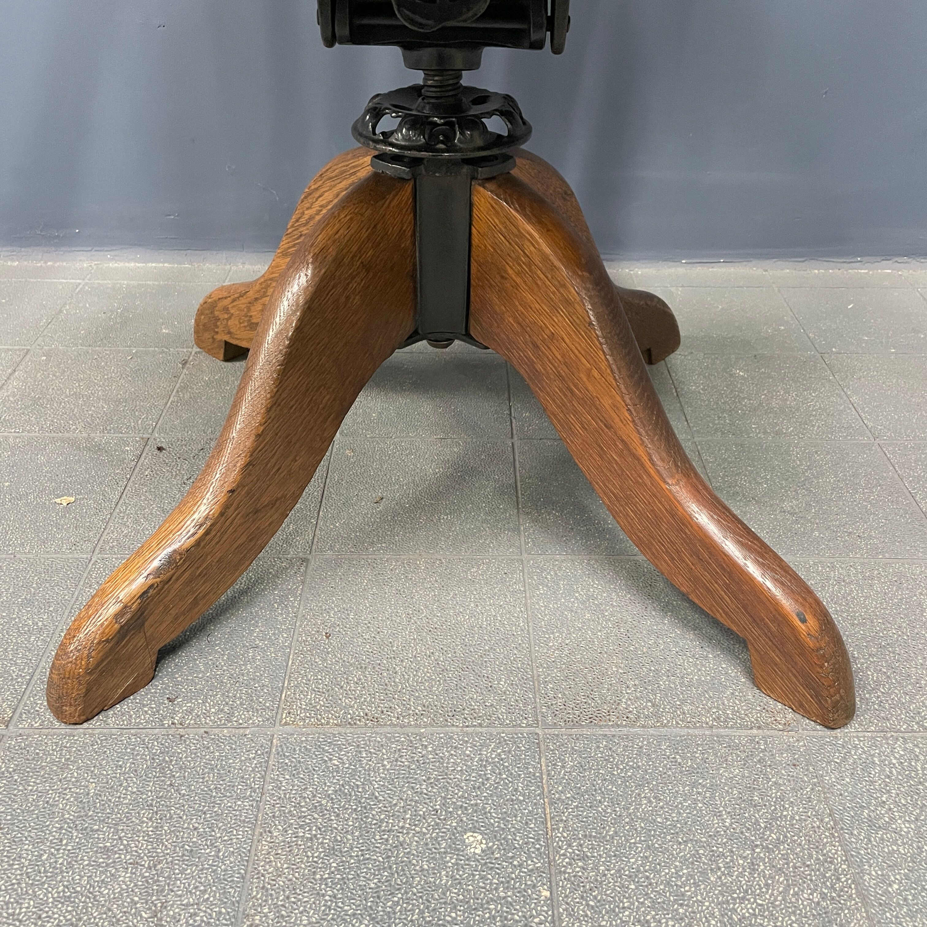 Antique American oak office chair with armrests 1920s
