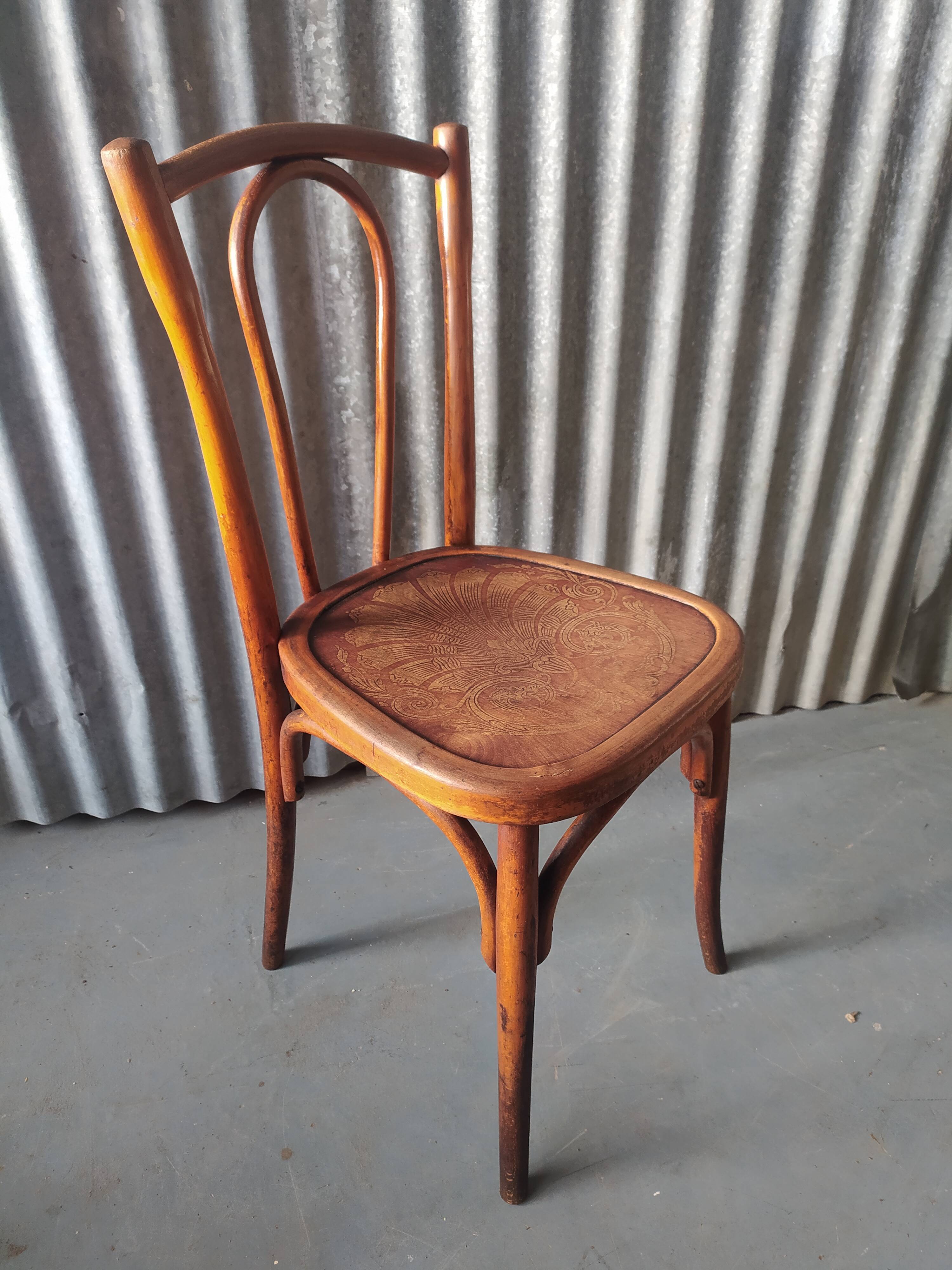 Curved wooden bistro chair