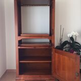 Man standing TV furniture - DVD player