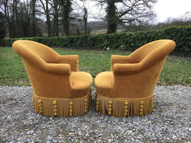 Duo de fauteuils vintage crapaud en tissu or