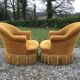 Duo de fauteuils vintage crapaud en tissu or